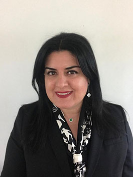 Dr. Tanavoli, smiling