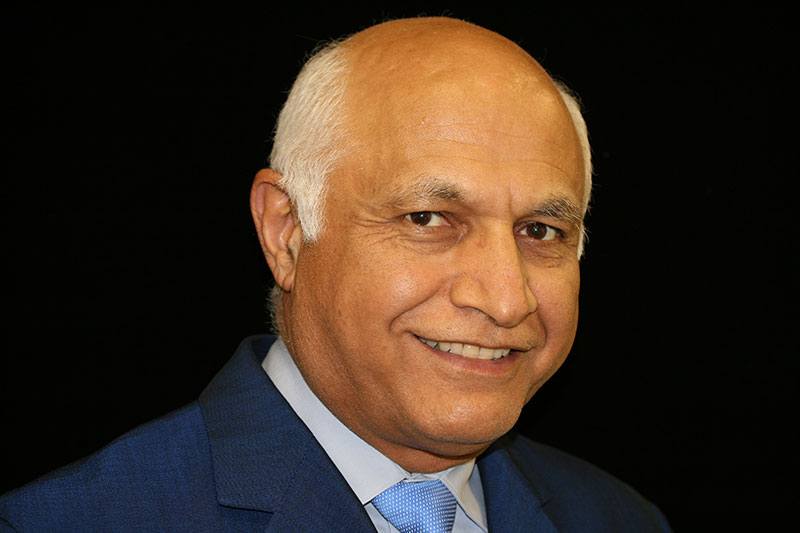 Dr. Daftary, smiling